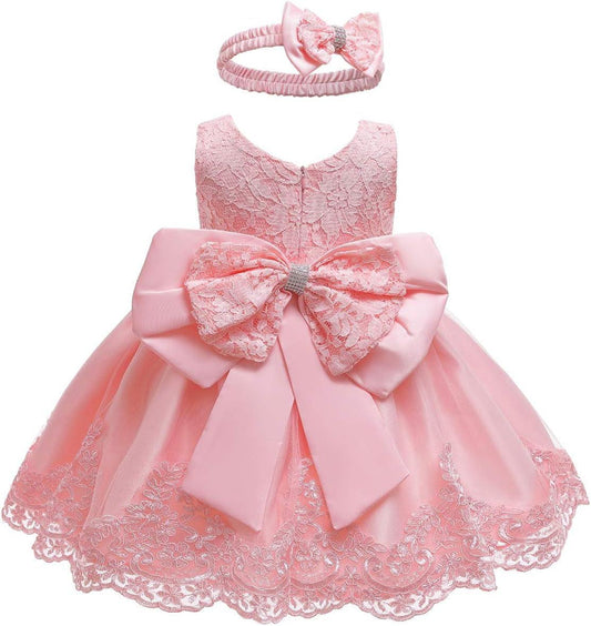 Pink lace baby dress and bow headband, back view with an oversized layered sash bow